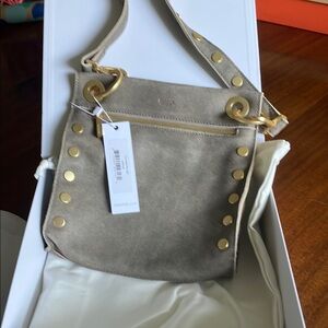 Hammitt Gray Shoulder Bag with Gold Accents
Includes dust bag and box.